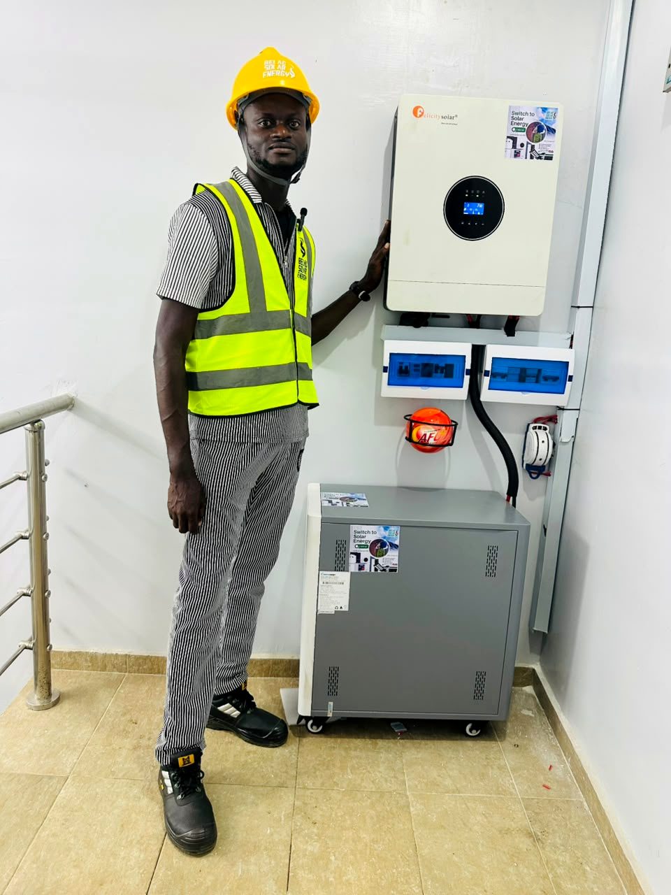 Belac Solar Energy engineer commissioning an inverter and battery system